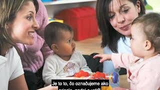 A still from the video The Science of Early Childhood Development with Slovak subtitles, showing two female caregivers holding two babies.