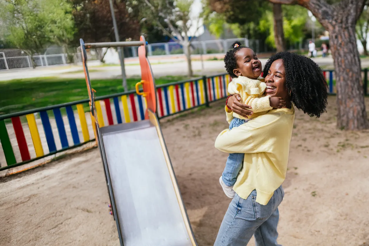 mom with child at playground